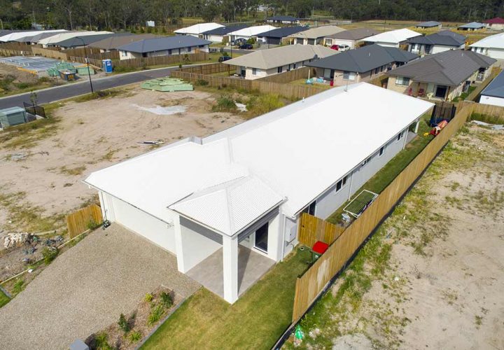 Top View of White Residential House — Metal Roofing In Coomera, QLD